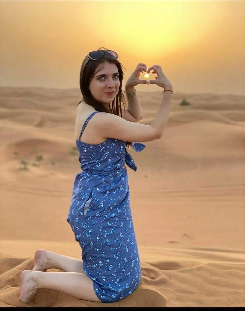 Traveller enjoying the golden sand dunes of the Thar Desert near Jaisalmer